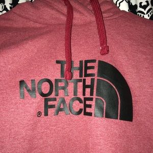 The north face red hoodie with black lettering